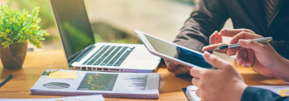 Business people are analyzing and planning business. Business Strategy Consulting